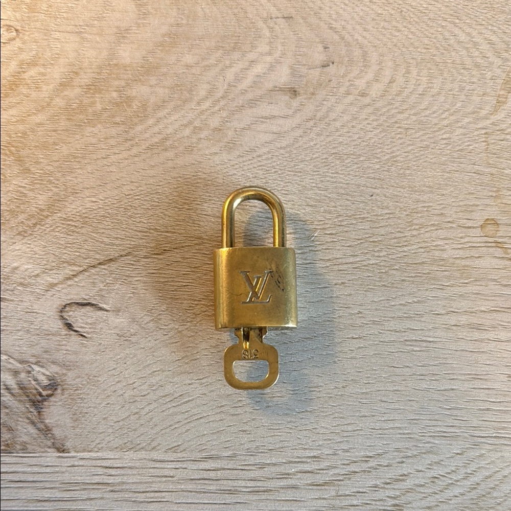 Louis Vuitton Gold Padlock with Key